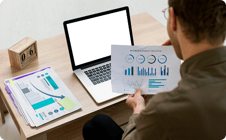 Person analyzing data on laptop representing data-driven decisions