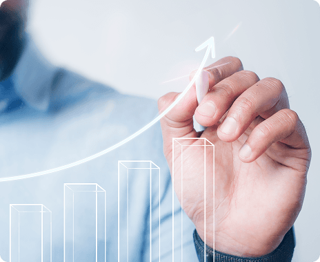 Hand interacting with financial growth charts on a transparent screen